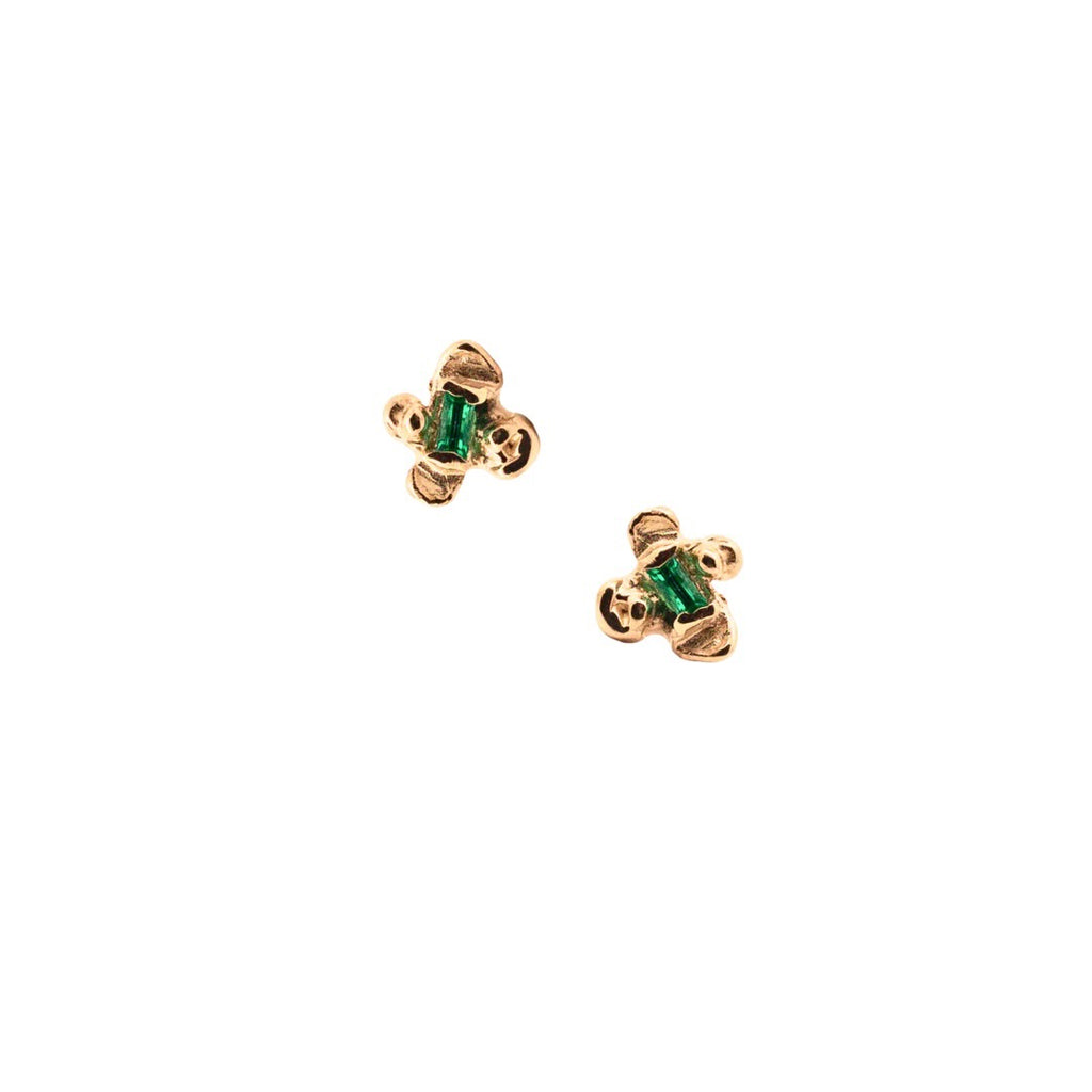 Idun is a four petal 14 gold flower stud earring with ethically mined Emeralds from Zambia.