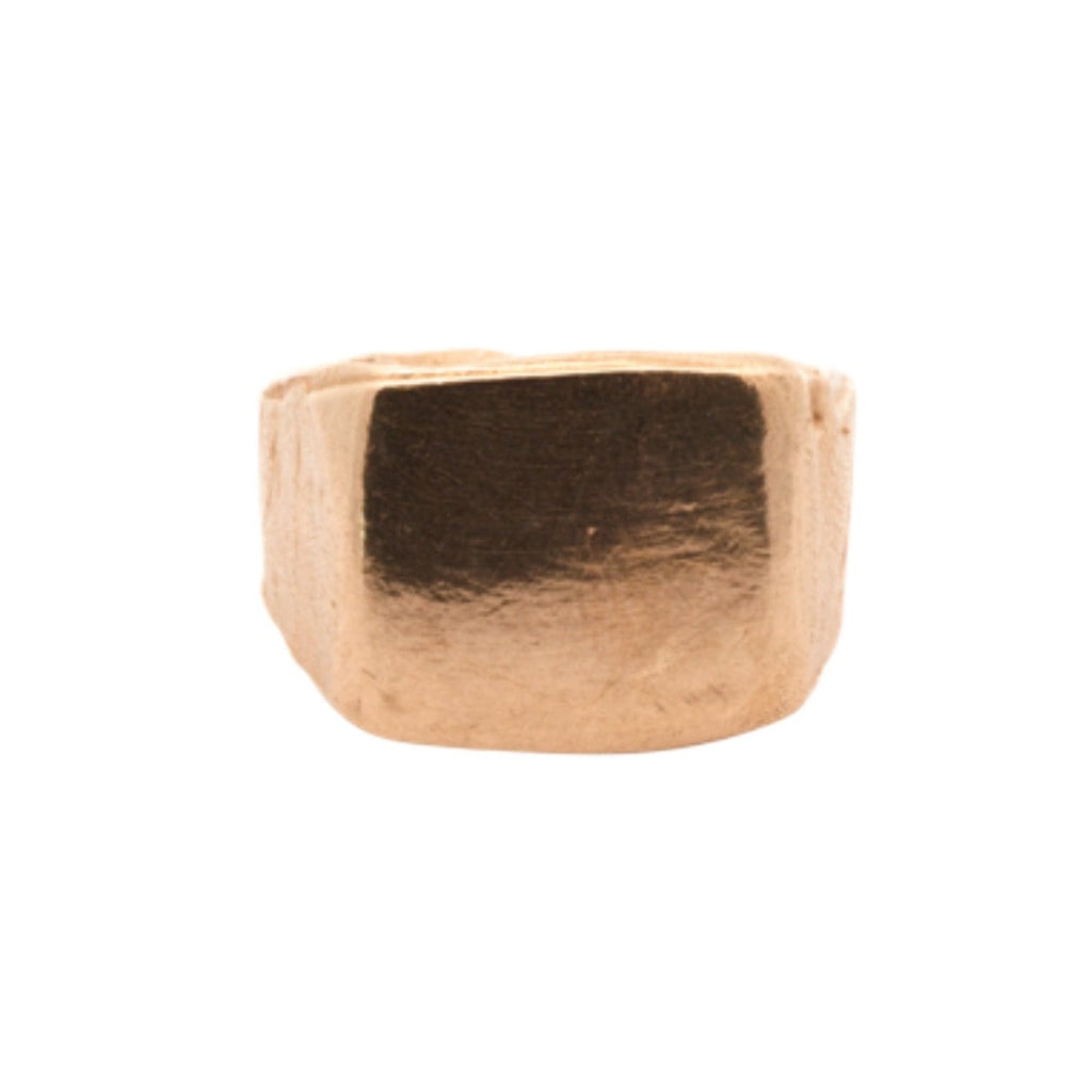 The Hansi signet ring in yellow gold is a large unisex statement ring. A blank canvas, it has strength in its streamlined design for the traditional pinky finger or a great layering ring.