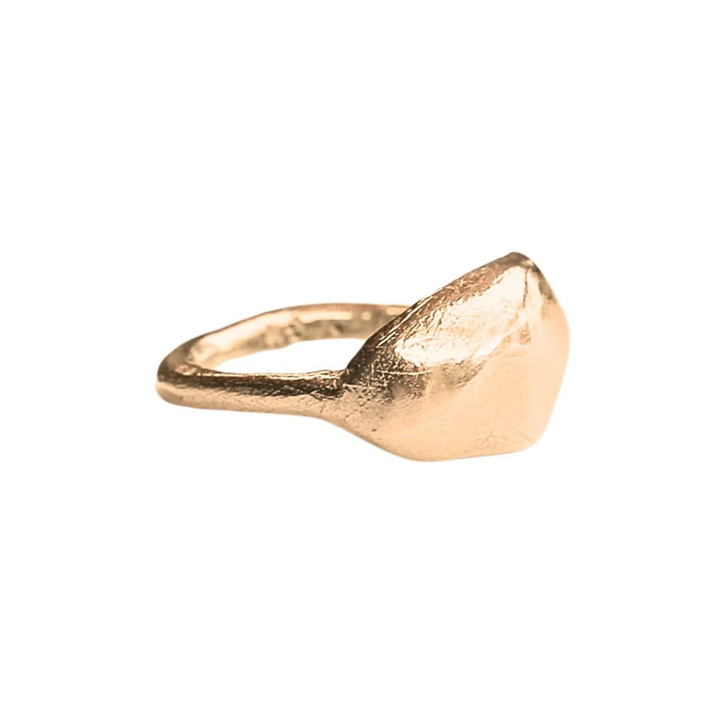 The Hilde low dome ring has a shield shape which can represent a protection talisman. Made for stacking or worn individually