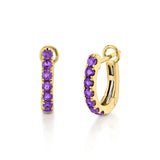 Yellow Gold Hinged huggie hoop earrings feature 7 amethyst colored gemstones in each hoop. 