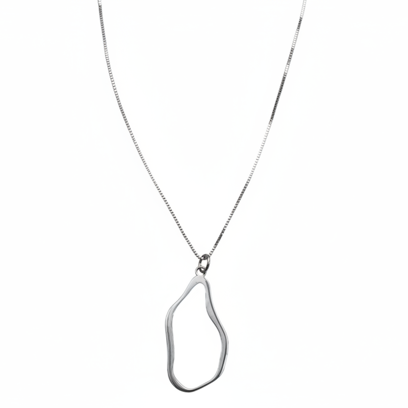 A silver toned necklace featuring a delicate chain and an abstract, open pendant with a polished finish