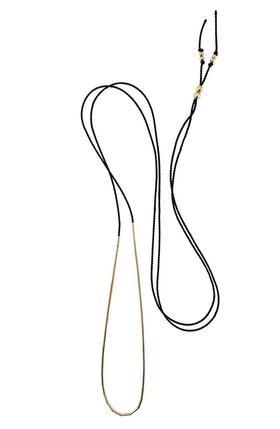 The Dorado is an elegant silk cord necklace for the ultra-minimalist. The single adjustable length strand adds a subtle touch of elegance, and for a bolder look layer up with multiple strands or with other necklaces. Black.