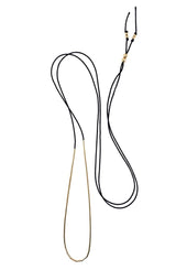 The Dorado is an elegant silk cord necklace for the ultra-minimalist. The single adjustable length strand adds a subtle touch of elegance, and for a bolder look layer up with multiple strands or with other necklaces. Black.