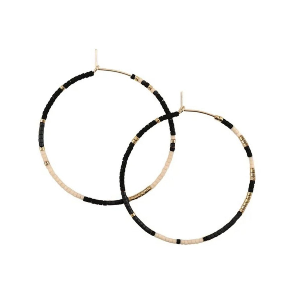 With Abacus Row's Tanami Hoops, designer Christina Trac plays with fixed and open pattern designs. Each earring hoop is hand hammered from 14k gold-filled wire and beaded by hand. These large hoops are whisper light for everyday adornment. Polar