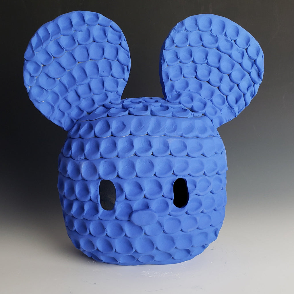 Ninkilim is a textured blue mouse head by Austyn Taylor that looks utterly squeezable! But it's clay! 