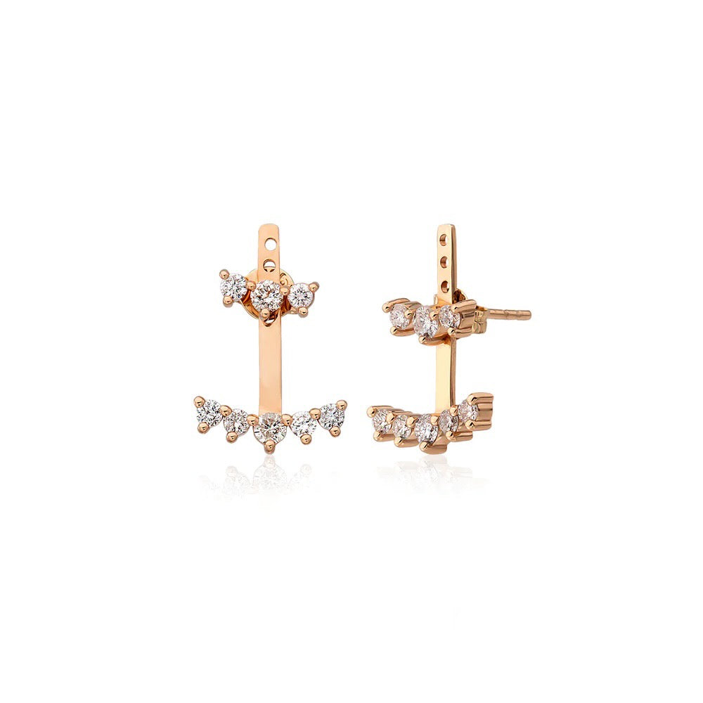 Major impact! These are statement earrings with their 2 tiers of diamonds and earring jacket. The top 3 diamonds go in your ear and the bottom 5 diamonds go below your lobe. Rose Gold