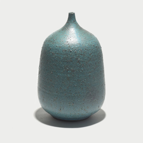 A popular and distinct style from the mid-century, we love Bob's take on the balloon vase in a gorgeous lagoon blue glaze.