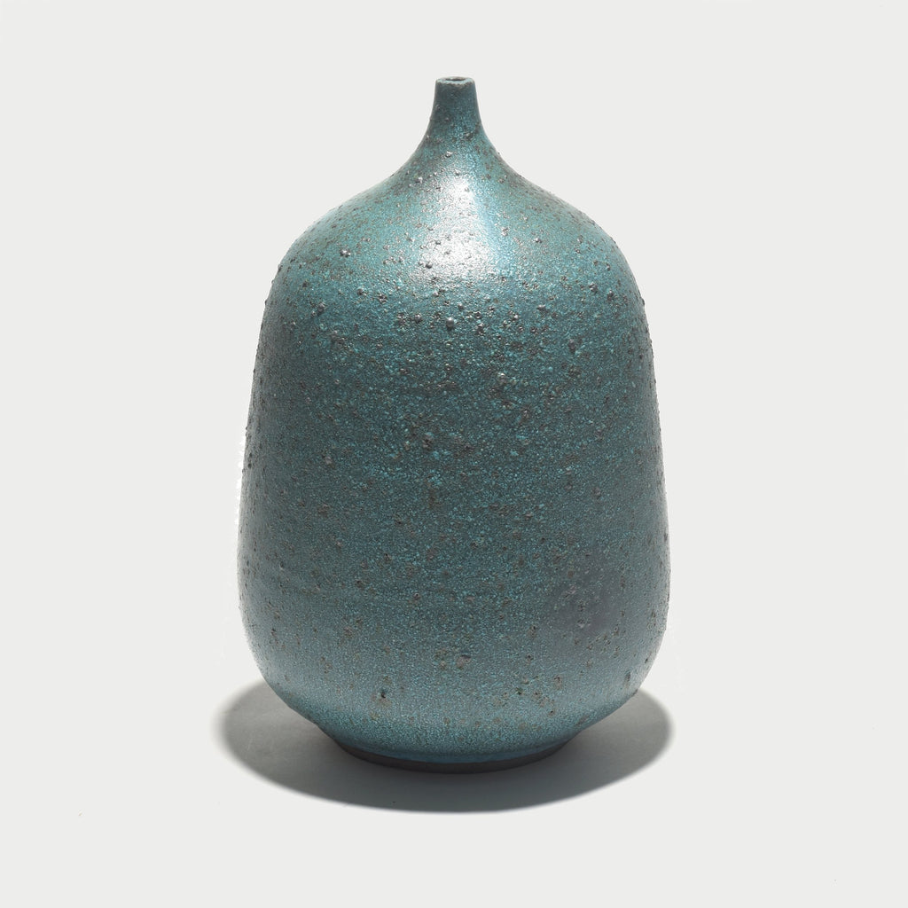 A popular and distinct style from the mid-century, we love Bob's take on the balloon vase in a gorgeous lagoon blue glaze.