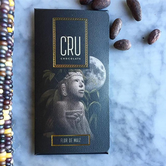 Cru Chocolate Cacao dark chocolate bar celebrates the union of fine cacao and heirloom corn key to Central American ancestral drinks.