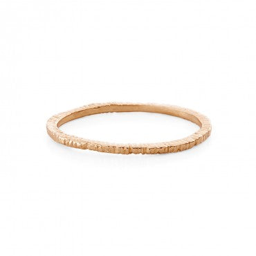 Add texture to your ring stack with these simple yellow and white gold super skinny etched bands. Danielle takes her signature woven technique to carved wax and cast in precious metal. It's the texture that really makes these beauties stand out.