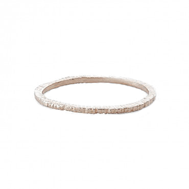 Add texture to your ring stack with these simple yellow and white gold super skinny etched bands. Danielle takes her signature woven technique to carved wax and cast in precious metal. It's the texture that really makes these beauties stand out.