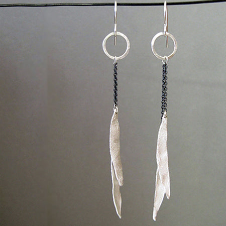 Esther Metals Feathery Earrings will be your go-to earrings with their glistening silver handcrafted feathery wings. 