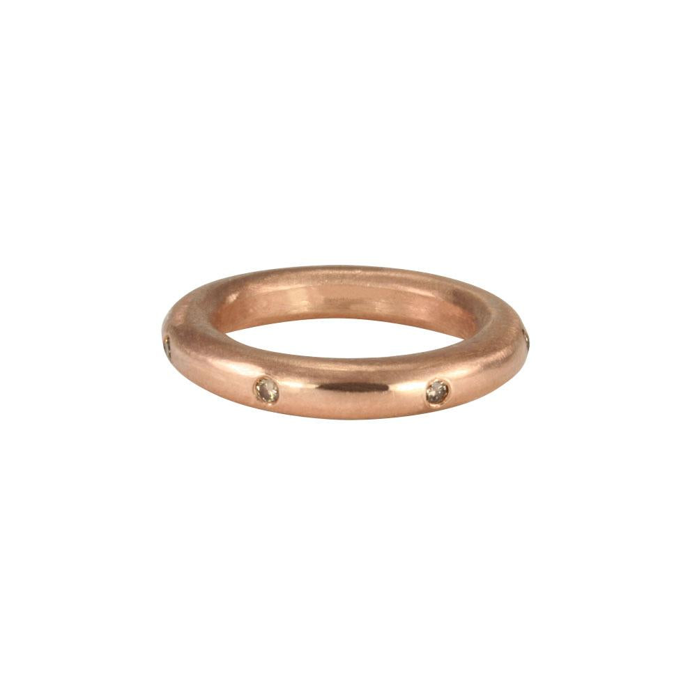 Stunning layered or alone–goes with everything, thick round stacking rings. Mixed metals available in sterling silver; 14k yellow, white or rose gold; or platinum. Take your stack to another level, embellished with diamonds and gems. Rose gold with cognac diamonds shown. 