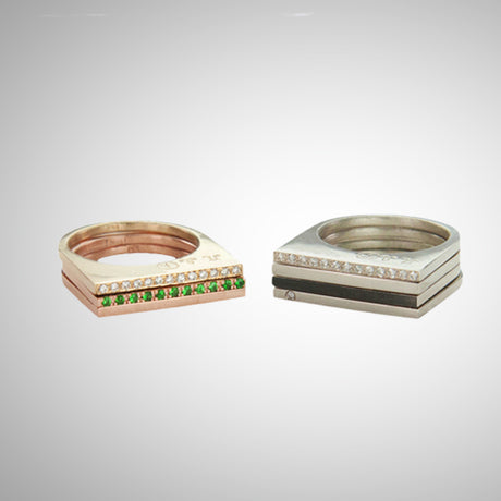 Add dramatic height and sparkle to your stacking rings with Jeffrey Levin's super flat skinnys in 14K yellow gold encrusted in diamonds or colorful gems. Inspired by beautiful bon bon desert plating, Jeffrey designed a unique proportion and stunning surface in mixed metals with pave set diamonds.