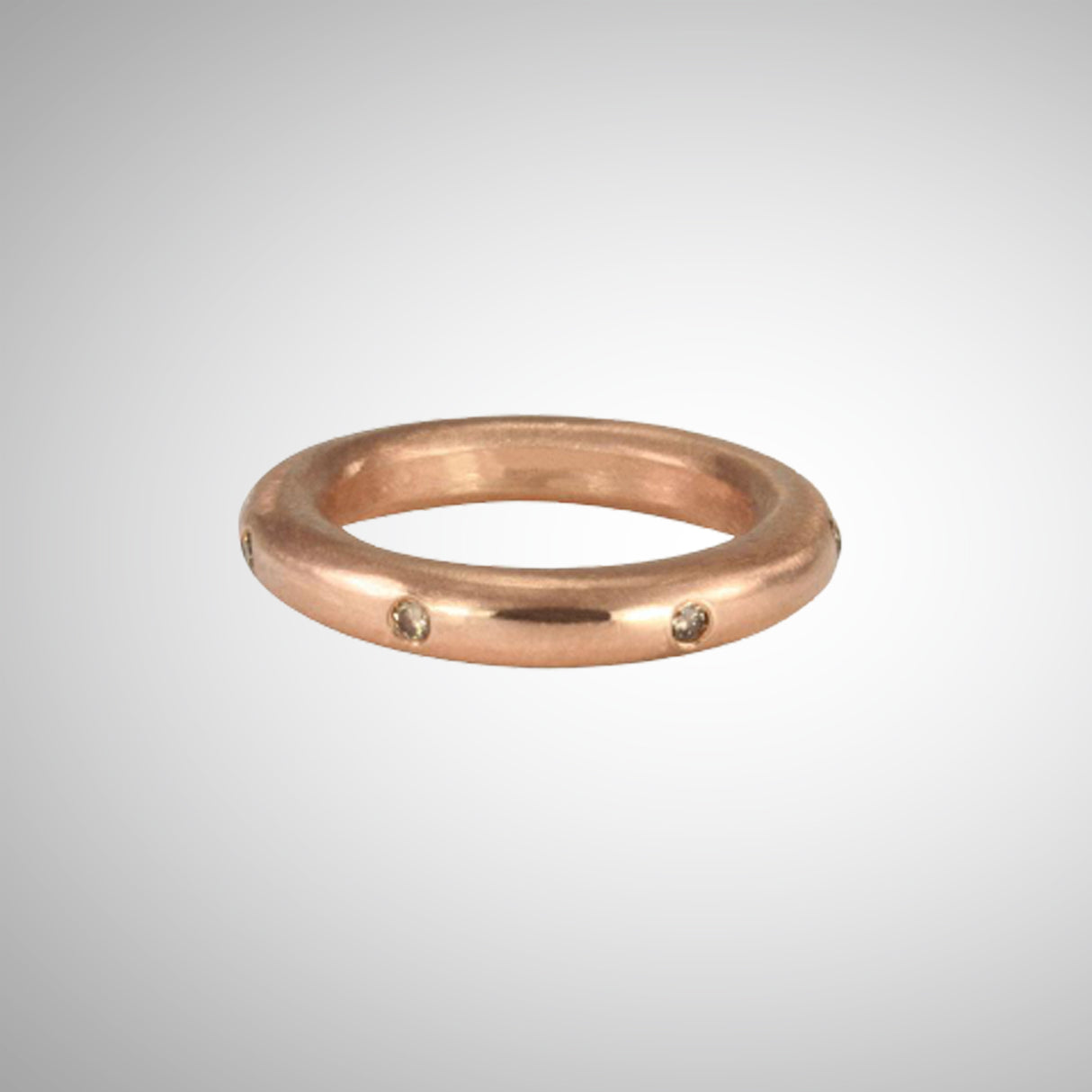 Stunning layered or alone–goes with everything, thick round stacking rings. Mixed metals available in sterling silver; 14k yellow, white or rose gold; or platinum. Take your stack to another level, embellished with diamonds and gems. Rose gold with cognac diamonds shown. 