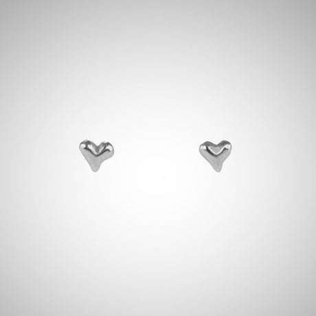 Jeffrey has been carving hearts from the beginning. These are his most tiny, carved by hand in wax before being cast in precious metals. Perfect for layering as multiples. Shown in sterling silver.