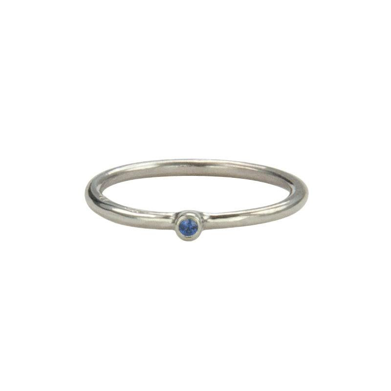 Jeffrey Levin Super Skinny stacking ring in 14K white gold with single stone blue sapphire is delicate and designed for stacking.