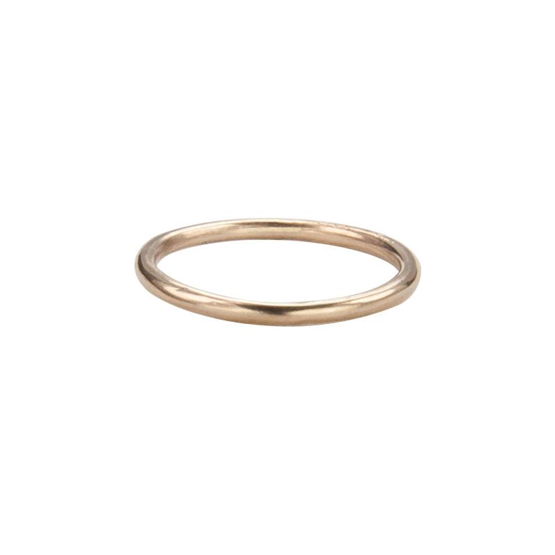 Jeffrey Levin's 14K rose gold super skinny rings pair well with engagement rings and wedding bands. 