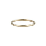 Jeffrey Levin's 14K yellow gold super skinny rings pair well with engagement rings and wedding bands. 