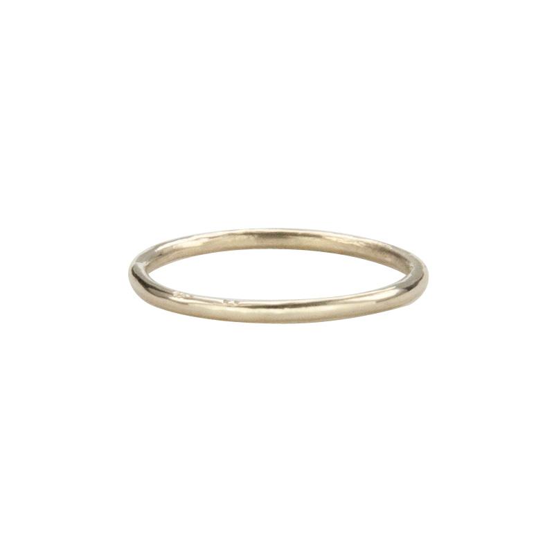 Jeffrey Levin's 14K yellow gold super skinny rings pair well with engagement rings and wedding bands. 