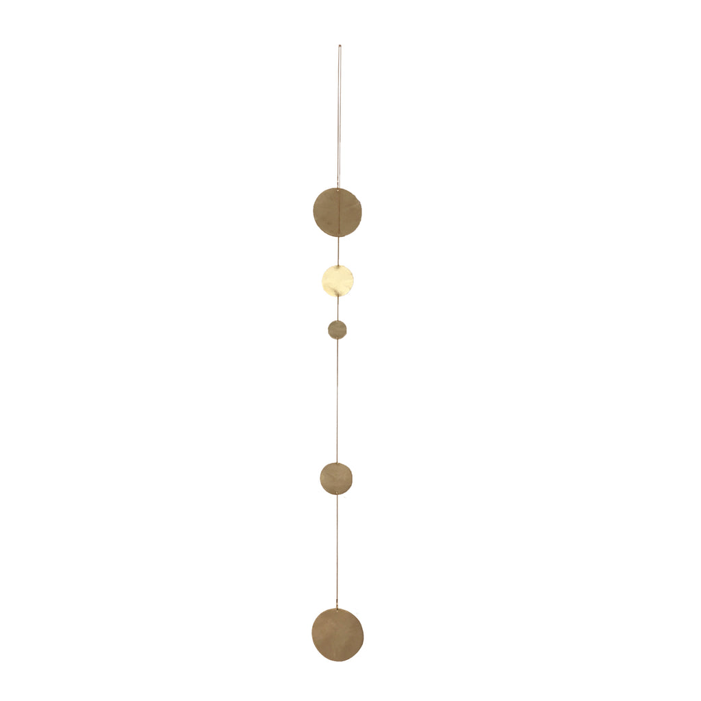 Rain is a beautiful hanging mobile made from Copenhagen architect Kaja Skytte out of brass discs and chain.