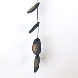 The Droplets is a hand built ceramic wall hanging with references to water, pebbles and other natural materials. The freeform shapes have a visceral quality, inspired by observations of landscape, the natural world, textiles, and metallic elements. 