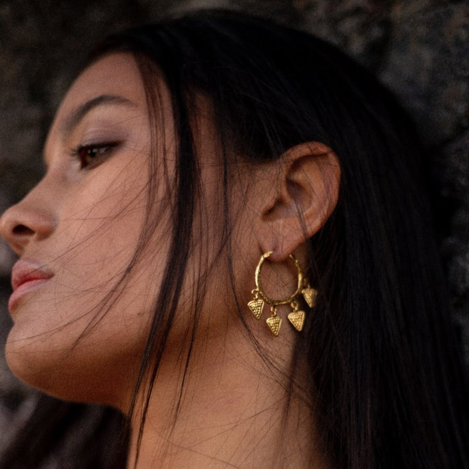 Wear the Temptress of the Vine earrings as an amulet of the rugged and vivid poetry of the natural elements and the world that beckons us.