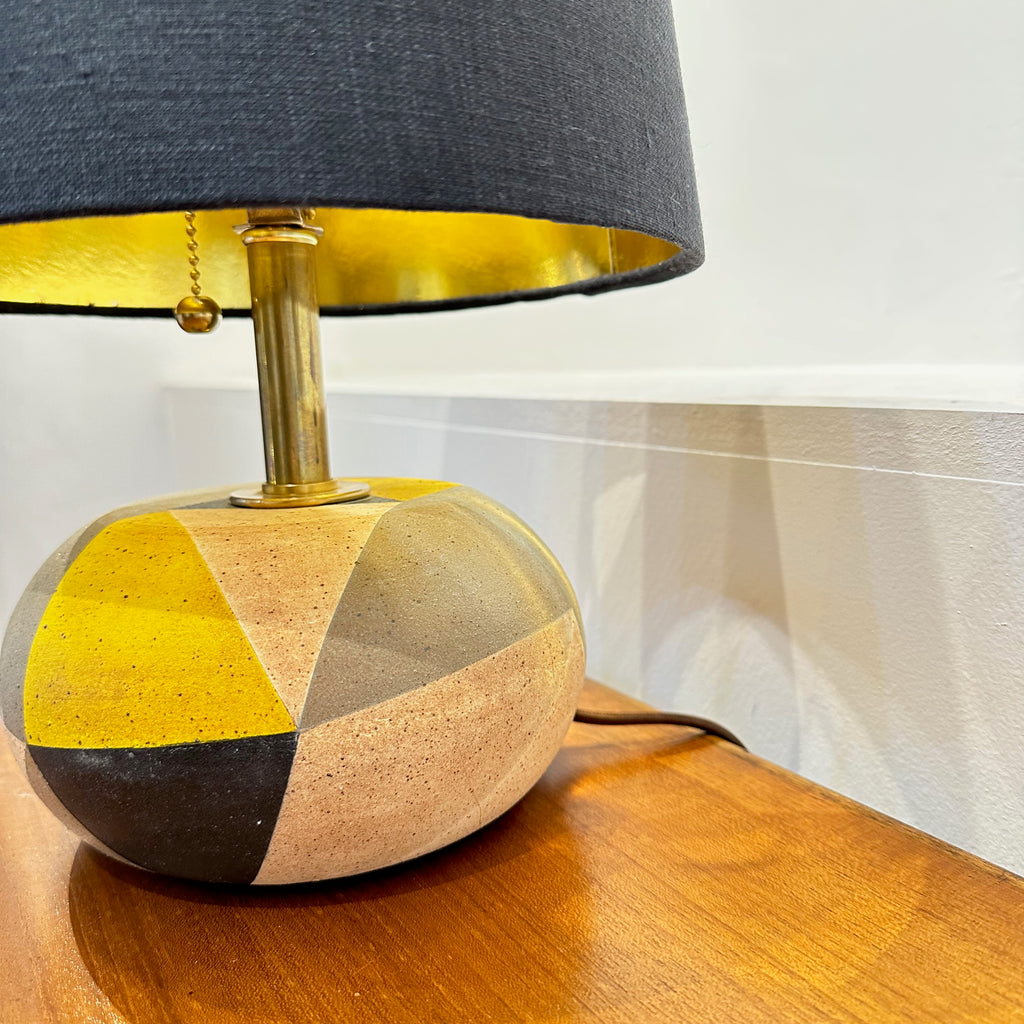 Light up your workspace with our unique Sparo Desk Lamp! Perfect for cozy nights in your bedroom. Or style a corner with its midcentury design. 