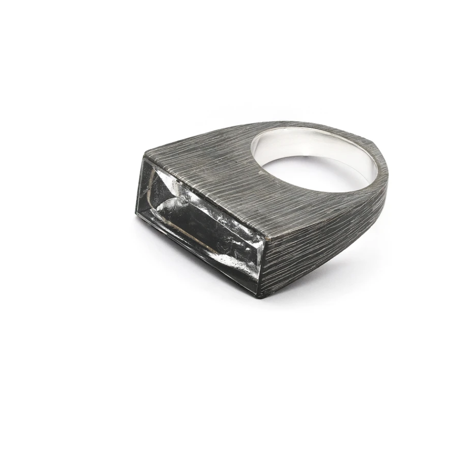 The high contrast and strong profile of these light box rings both draws in and reflects the light. Adorn your ring stack with this mood lifting accoutrement! Side view, showing hand finished, polished and oxidized silver. Top side view.