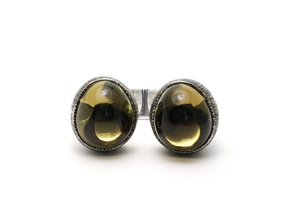 Mariella Pilato Crystal Heart Rings. Heart construction wraps around your finger with bold crystal domes on each peak, set in an etched and oxidized band. Front view smoky quartz