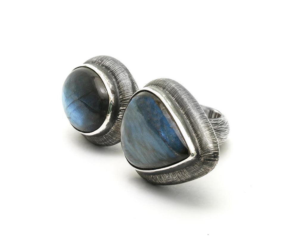 Oval and angular labradorite stones set in etched and oxidized sterling silver by Mariella Pilato. Other side view