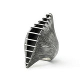 Side view revealing Mariella Pilato's hand finishing, polishing and oxidation technique.