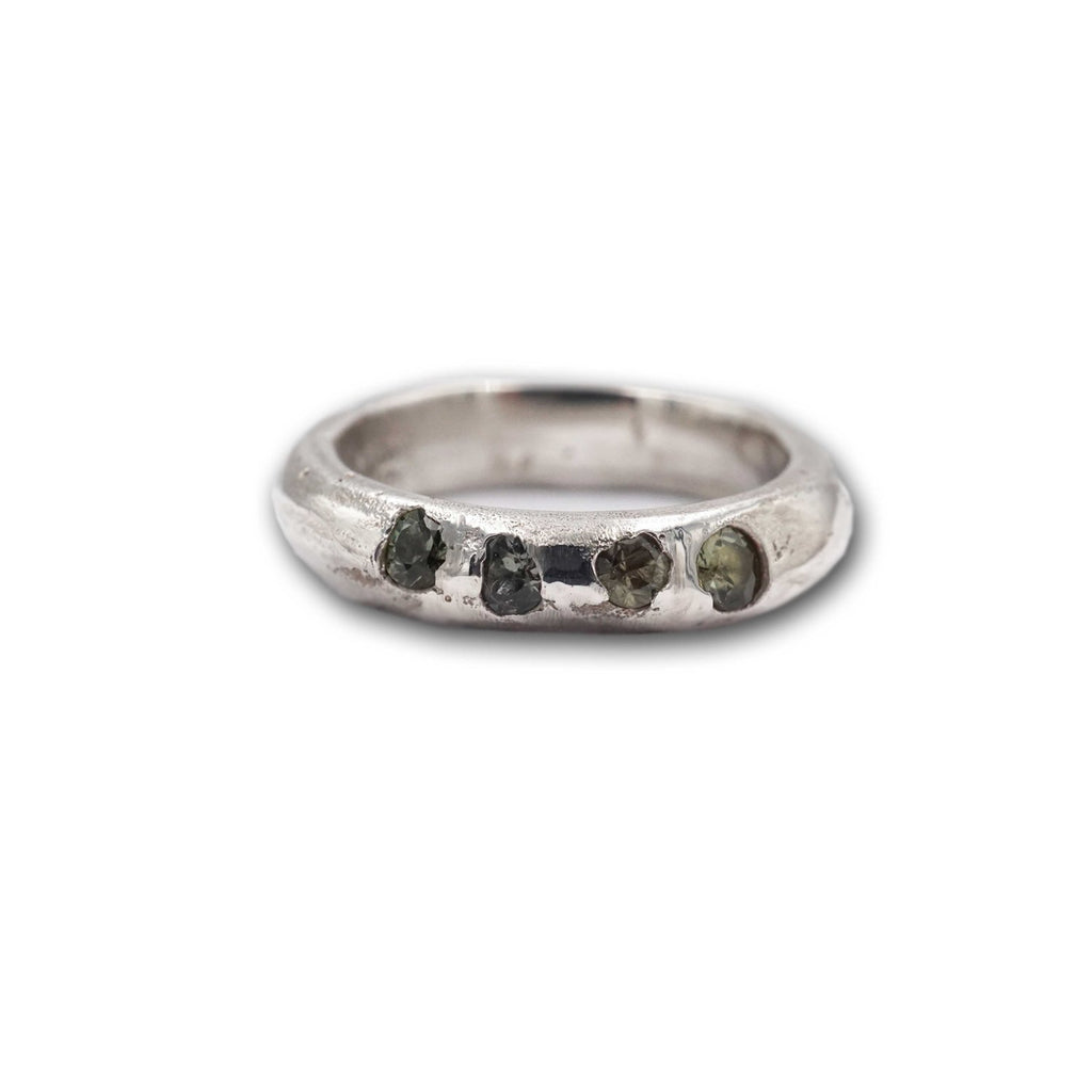Sand cast soft teal sapphire gem stacking rings with a wabi-sabi aesthetic look amazing as a single or stack!