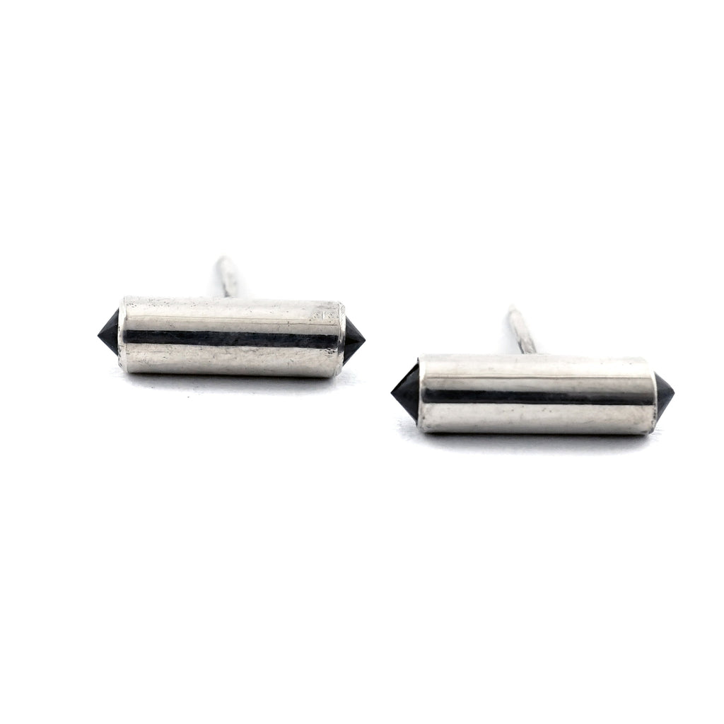 We love the look of these silver tube studs with black crystals on each end. Double stack them on one ear. Wear them every day! Made by Metal Atelier jewelry in Berlin