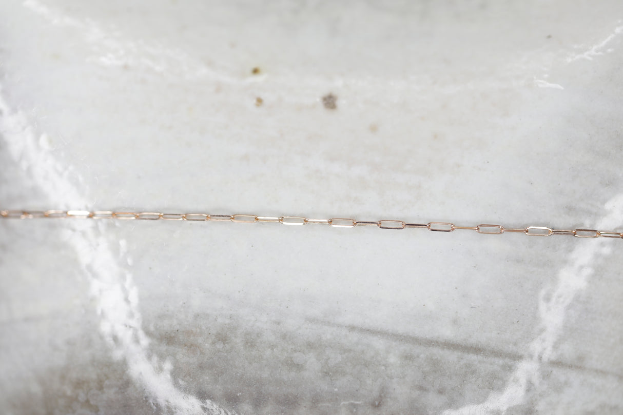 Permanent Jewelry Micro Paperclip Chain Link Bracelet. Get Linked at Poet and/the Bench in Mill Valley. 