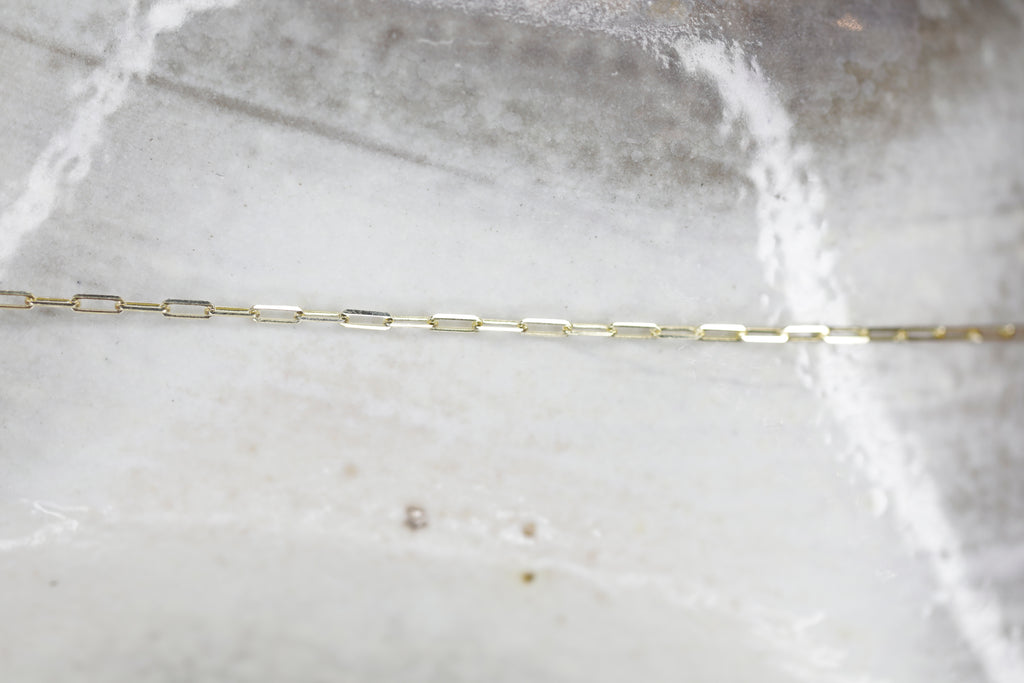 Permanent Jewelry Tiny Paperclip Chain Link Bracelet. Get Linked at Poet and/the Bench in Mill Valley.