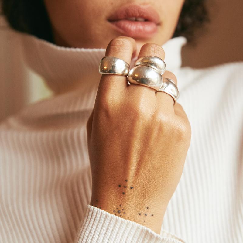 Orfeo collection rings shown on Natasha Garrett. Stacking Rings inspired by vintage. 