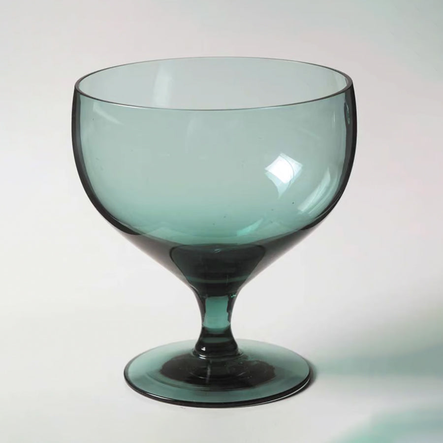These teal Russel Wright water glasses... or a goblet for a shrub, sparkling craft soda or juice and add fresh color to your bar and table.
