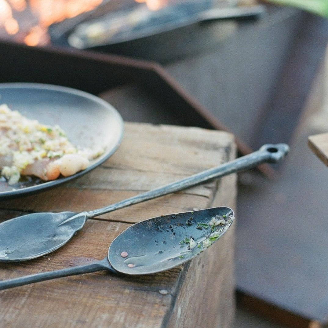 Spatula is 2-piece construction, hand forged by blacksmith Jorgen Harle in Oakland and riveted by metalsmith Kurtis Major to 1095 carbon steel with just the right amount of flex. 