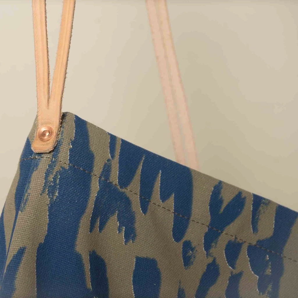 Carry the color of the seas and sun with you and save the planet... tote bags instead of plastic bags! Designed by Japanese fine artist and textile designer UG. Sonoko Soil Detail