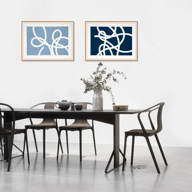 Jeffrey Palladini's Thread Series #2, Blue Almost Black, is his part of his most recent thesis and an exploration across materials. In this brand new work, the random looping and twisting patterns of a dropped length of twine are a seductive metaphor for the way we get from our aims and dreams to the outcomes. Shown framed (sold unframed) in a dining room setting with Thread Series #3 Pale Blue.  