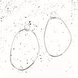 The sculptural nature of these Julia Olive earrings catch the light as they sway. A mix between the old and new, this earring is both modern and classic.