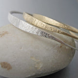 A high tide (“marea alta” in the language of the designer) inspired the design of these unique handmade bangles. The bracelet is elegant by itself, but it creates beautiful “swells” when combined with other "marea alta" bracelets of the same or different metals.