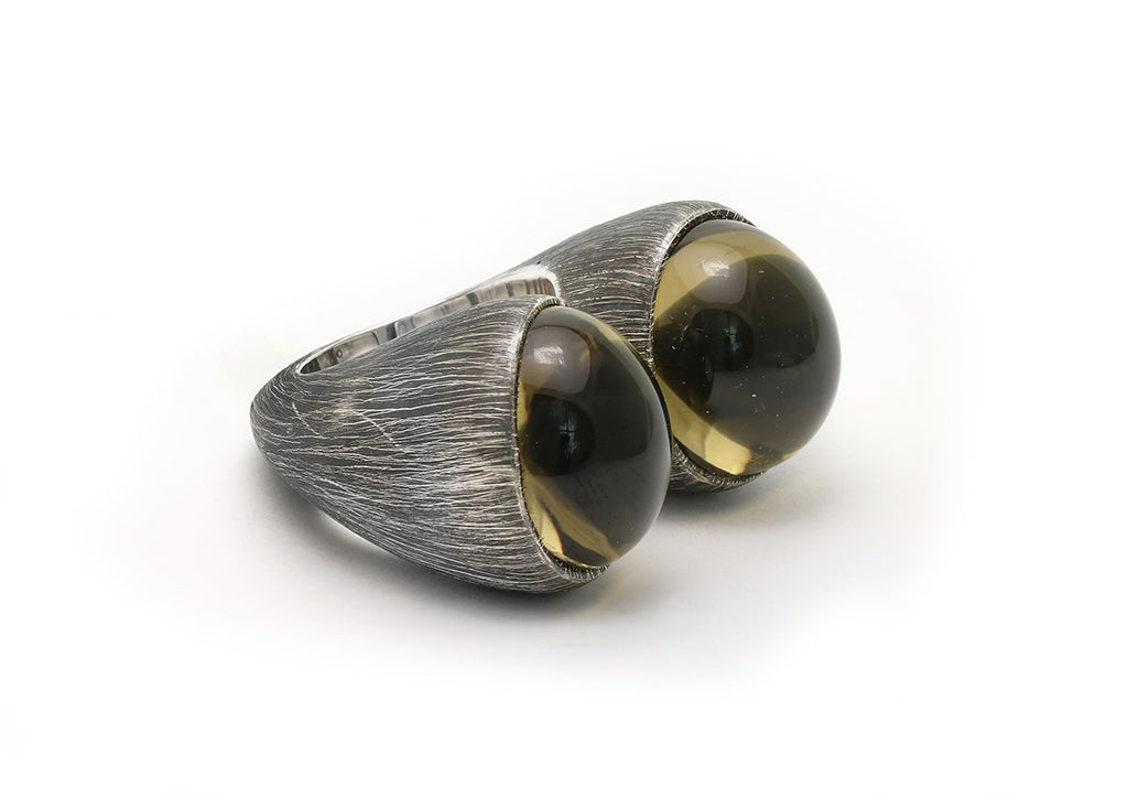 Mariella Pilato Crystal Heart Rings. Heart construction wraps around your finger with bold crystal domes on each peak, set in an etched and oxidized band. Smoky quartz side view.