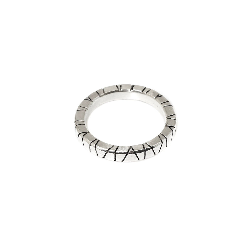We love the graphic carvings of the Annual Ring, stacked or layered across the hand, it makes a bold statement. 